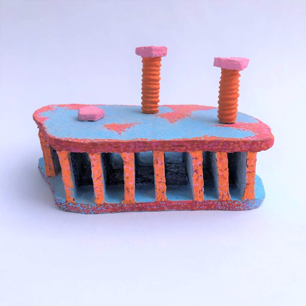 Cylinder head, paper mache and acrylic, 3.5”x6”x3.5”, 2021