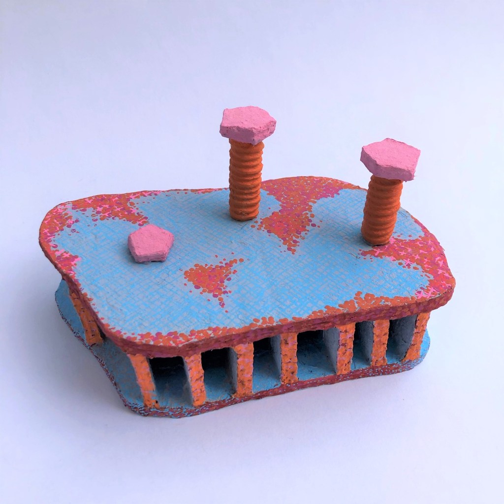 Cylinder head, paper mache and acrylic, 3.5”x6”x3.5”, 2021